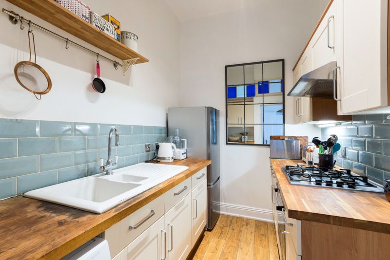 Property photo 3 of 12 Kitchen