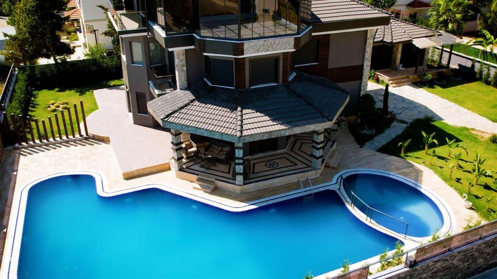 Property photo 1 of 19 Masterpiece Villa With A Private Pool, Sauna &amp; Garden For Sale In Belek - Main View Of The Luxury Villa And Pool