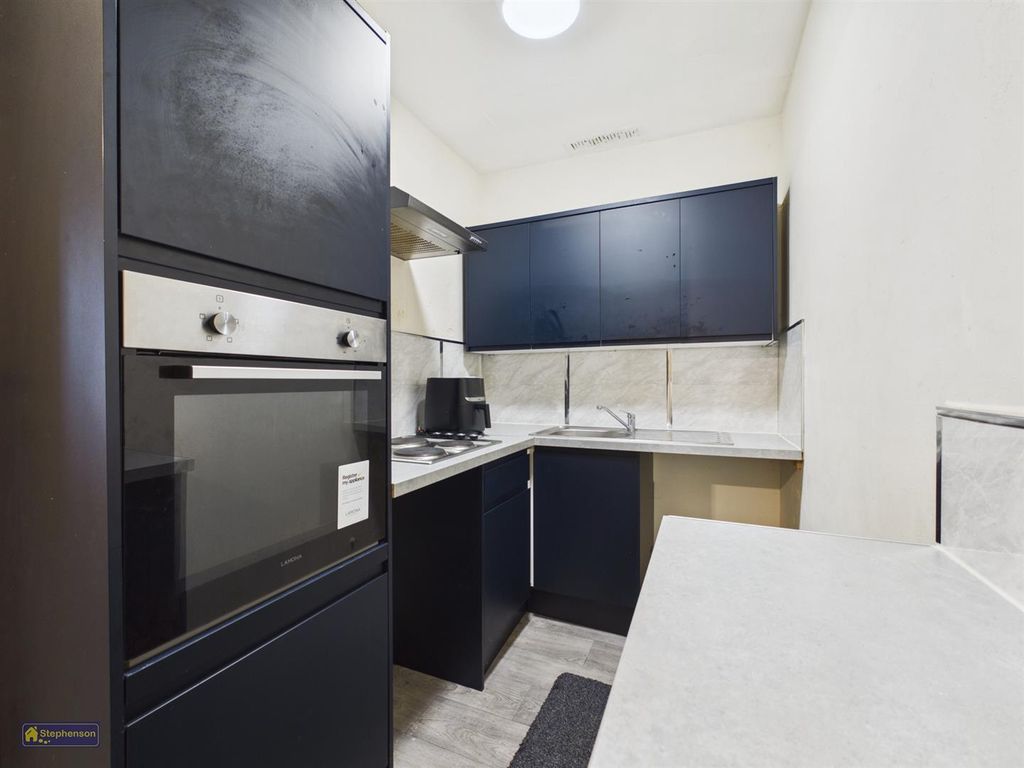 Property photo 2 of 6 Kitchen