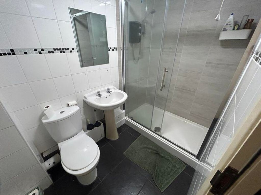 Property photo 3 of 9 A Modern Bathroom Featuring A Clean And Functional...
