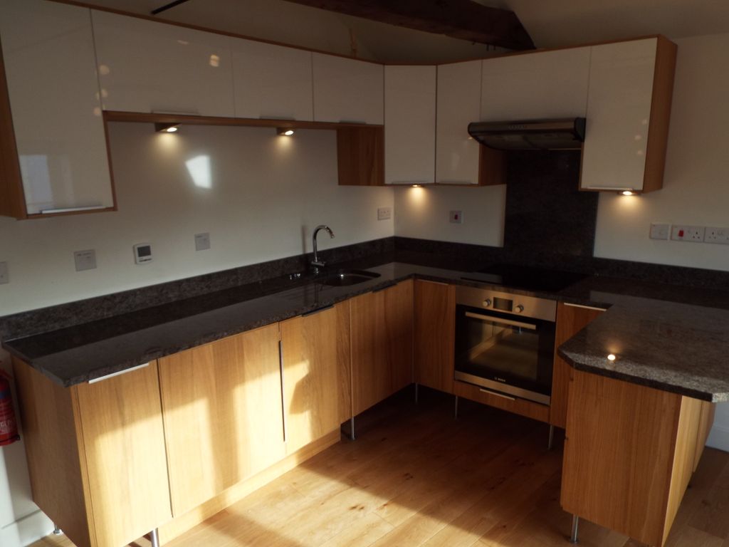 Property photo 2 of 8 Kitchen