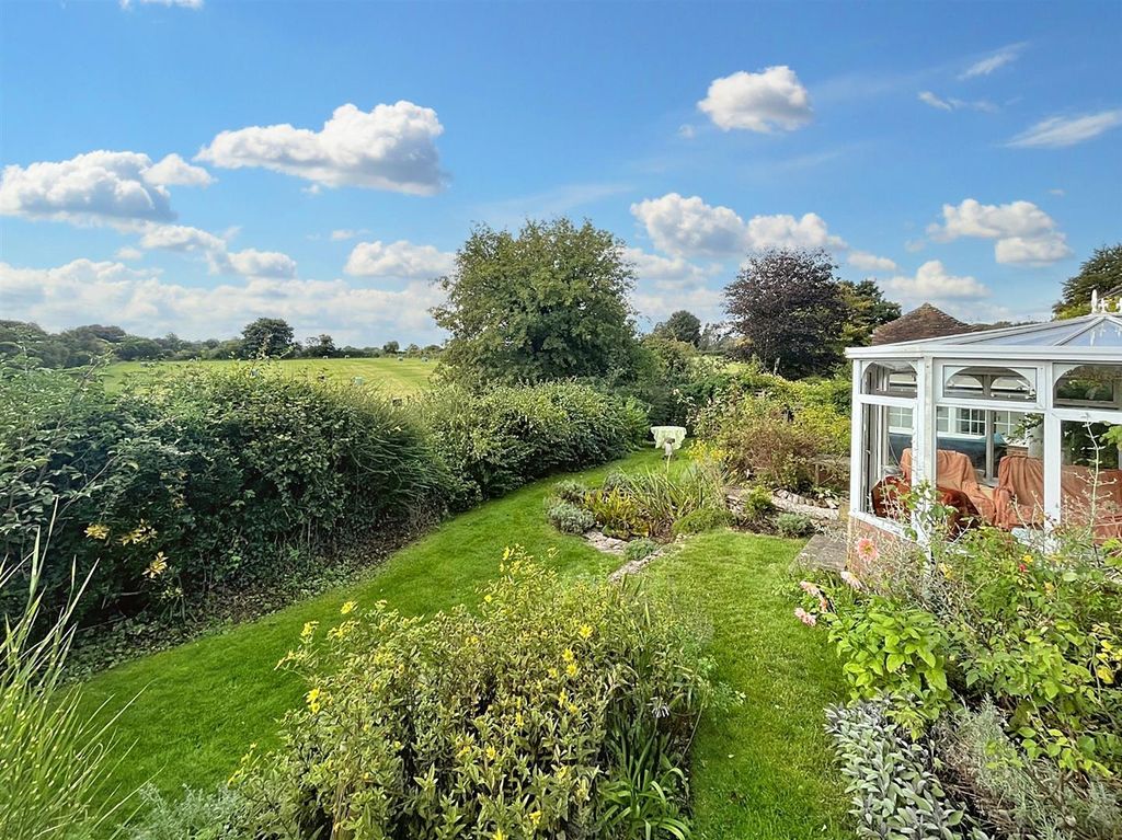 Property photo 2 of 19 Garden And View