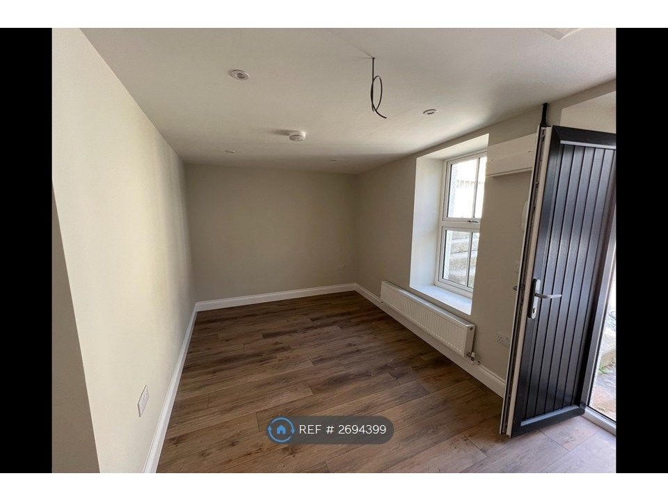 Property photo 1 of 4 Living Area