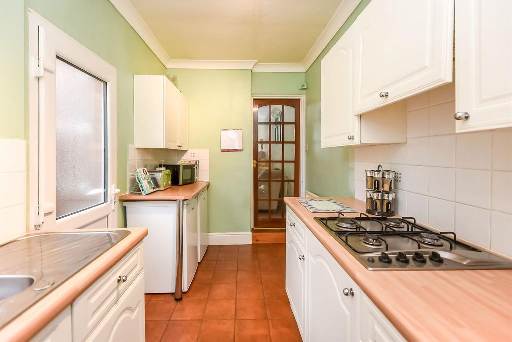 Property photo 2 of 12 Kitchen