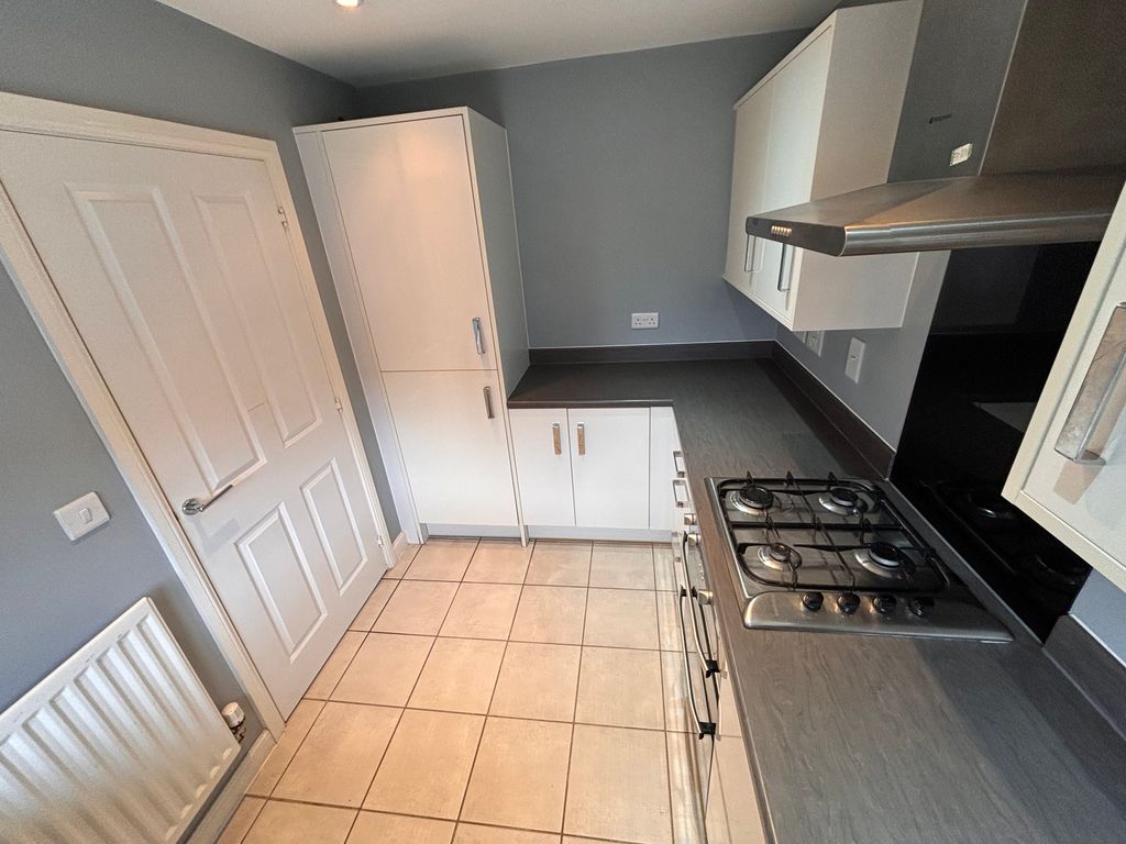 Property photo 3 of 12 Kitchen