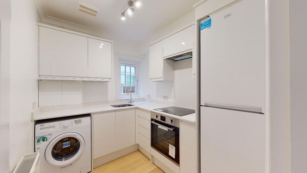 Property photo 3 of 7 Kitchen