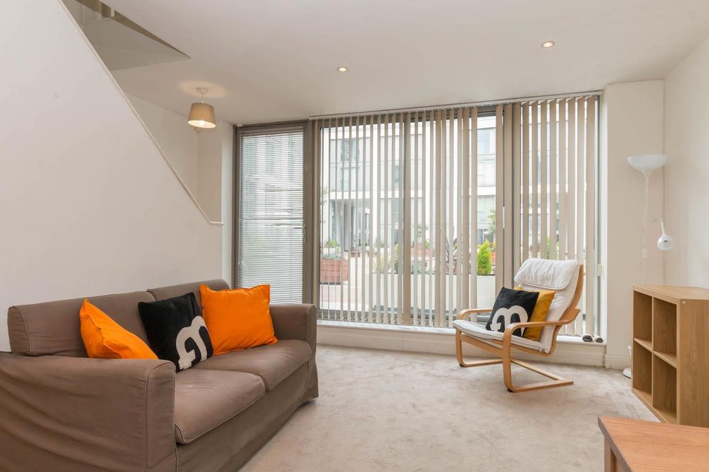 Property photo 1 of 9 Living Area