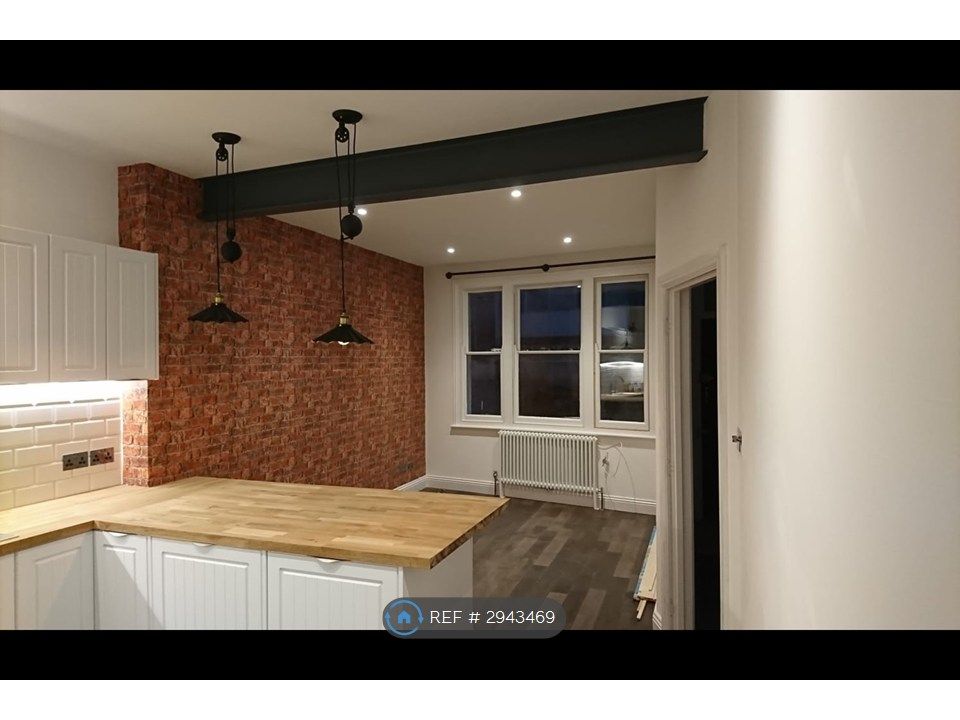 Property photo 1 of 10 Kitchen With Real Wooden Floor