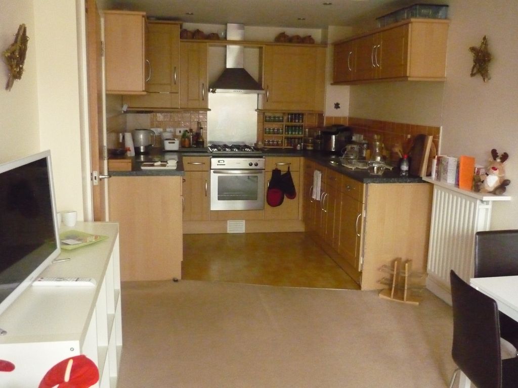 Property photo 3 of 8 Kitchen Area