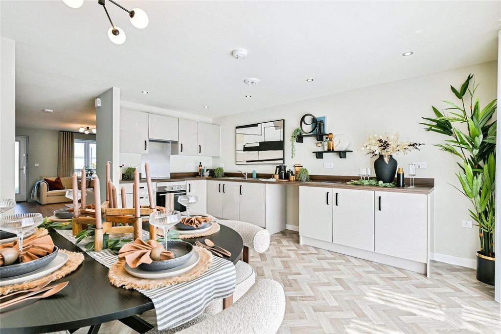Property photo 2 of 11 Typical Kitchen