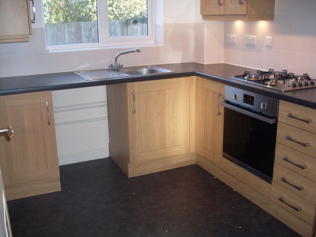 Property photo 3 of 12 Kitchen