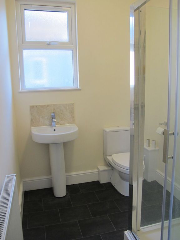 Property photo 3 of 3 This Modern Bathroom Suite Features A Clean Design...