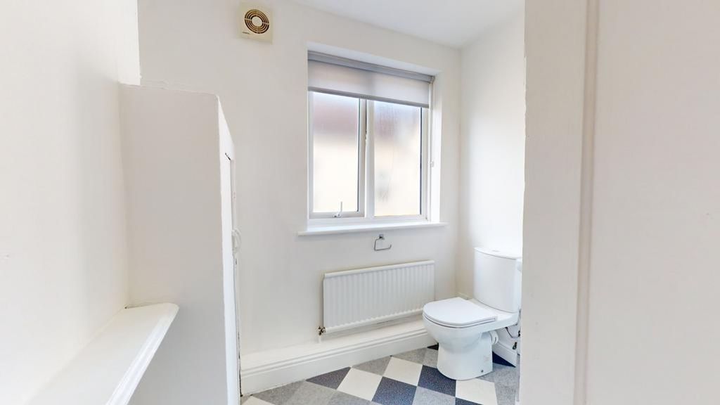 Property photo 2 of 33 A Bright And Tidy Bathroom Featuring Modern Fixtur...