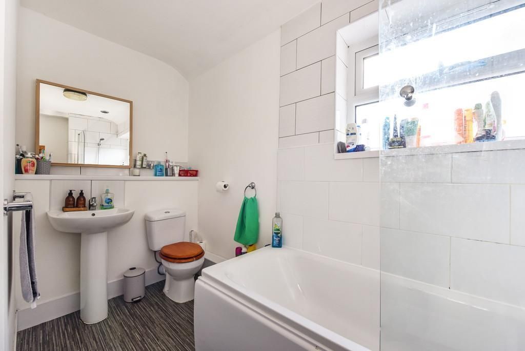 Property photo 1 of 5 Bright Bathroom With Bathtub And Stylish Mirror...