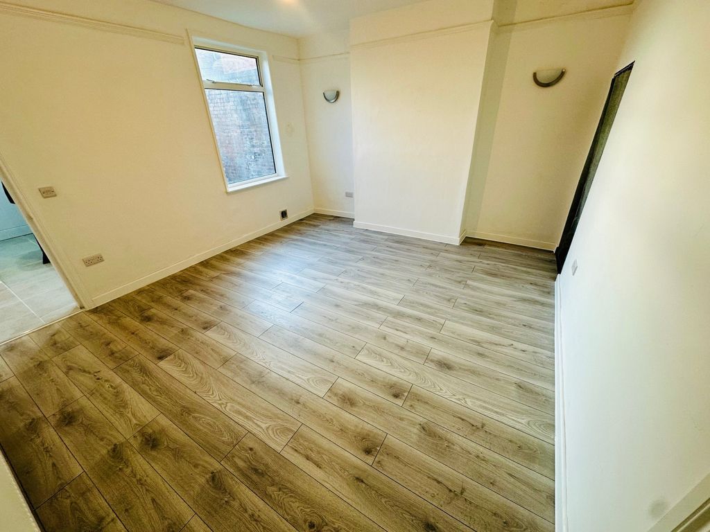 Property photo 2 of 12 Living Room