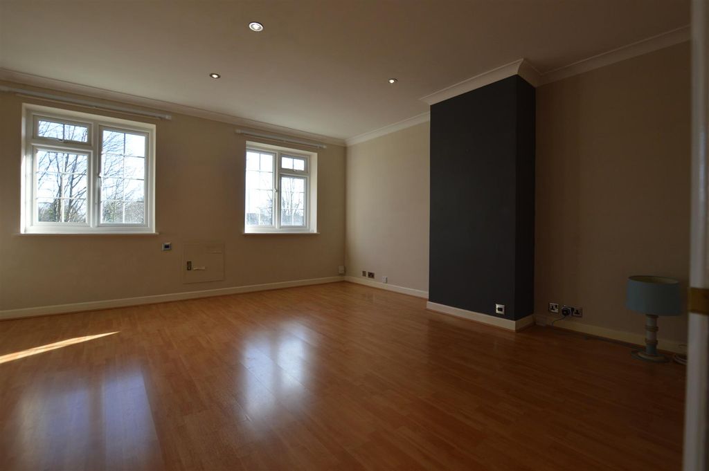 Property photo 2 of 11 Living Area