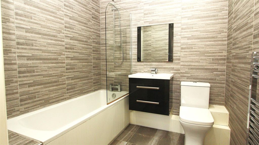 Property photo 3 of 6 Modern Tiled Bathroom With Stylish Vanity Unit...
