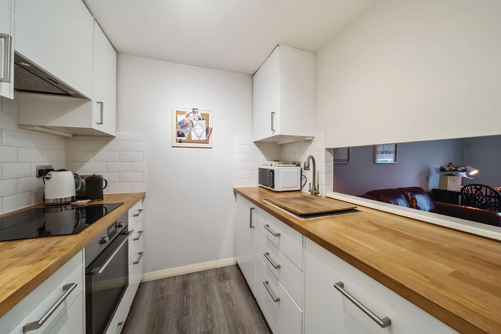 Property photo 1 of 12 Kitchen
