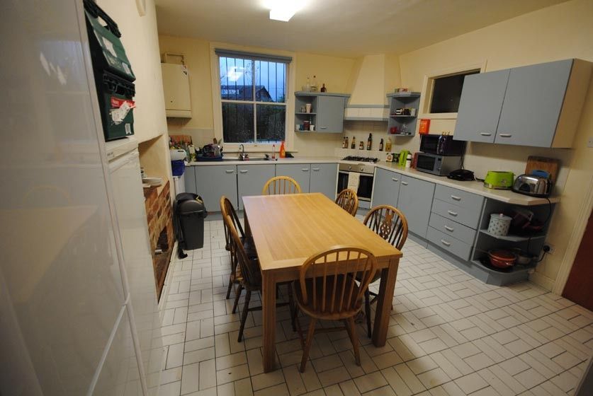 Property photo 3 of 12 A Well-Maintained Kitchen With Ample Storage, A ce...
