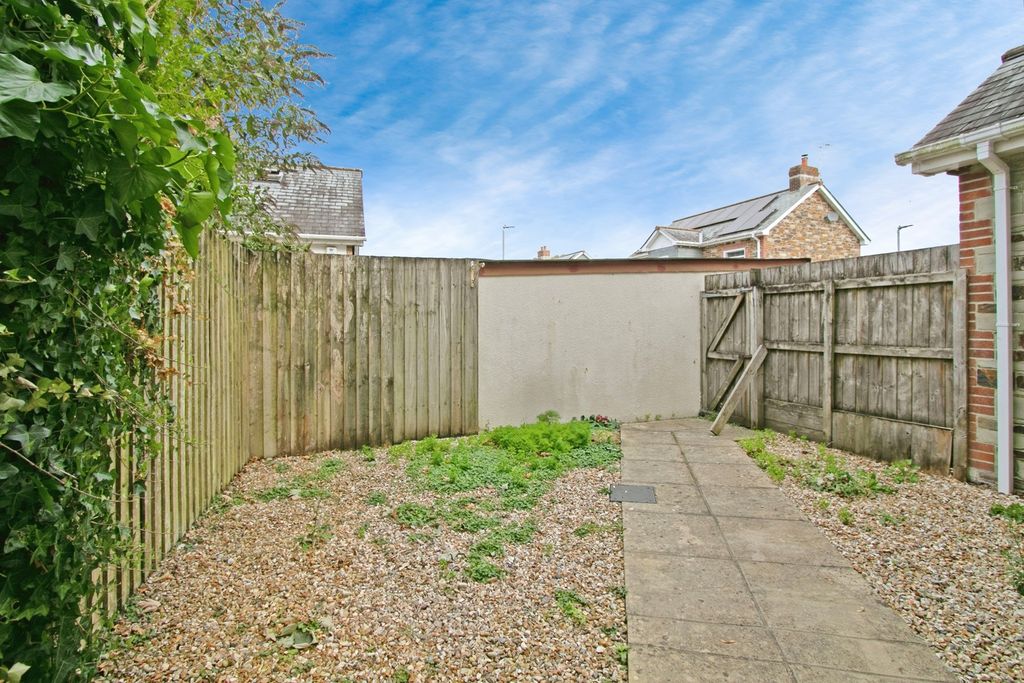 Property photo 3 of 14 Rear/Side Garden