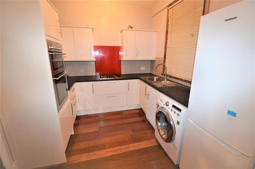 Property photo 1 of 3 Kitchen