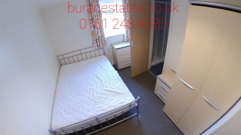 Property photo 1 of 13 A Tidy Single Bedroom Featuring A Neatly Made Bed,...