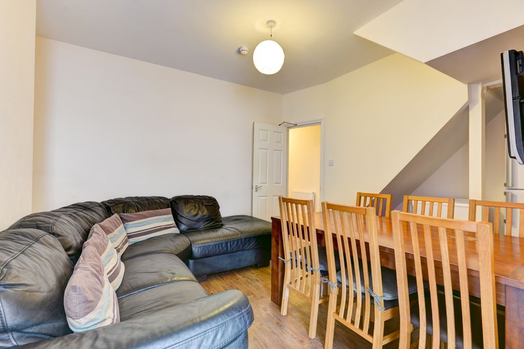 Property photo 1 of 14 Spacious And Welcoming Living Room With Ample Natu...