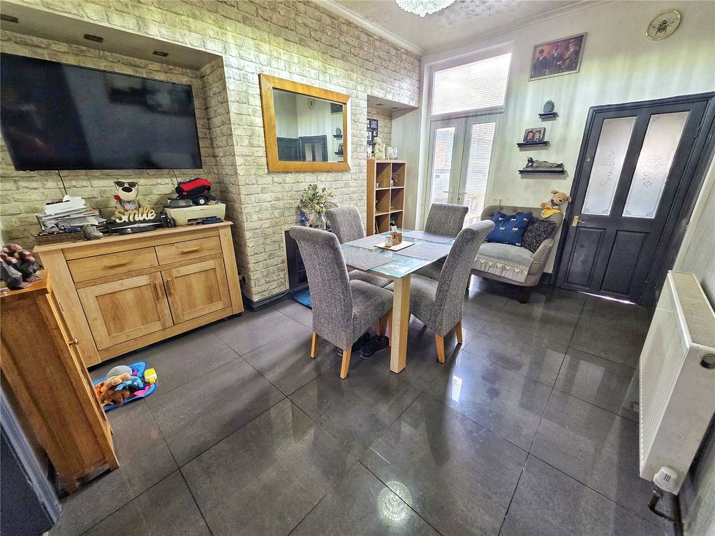 Property photo 3 of 12 Dining Room