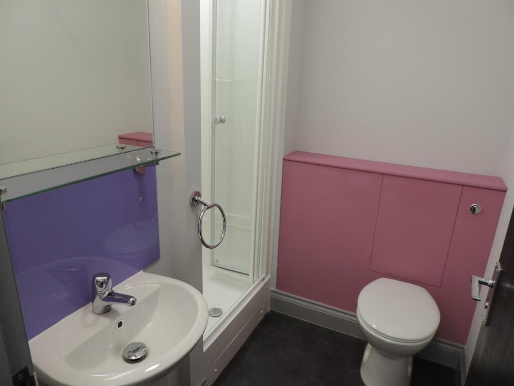 Property photo 3 of 4 Modern Shower Room With Bright Colorful Accents...