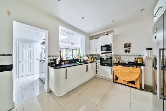 Property photo 3 of 12 Kitchen
