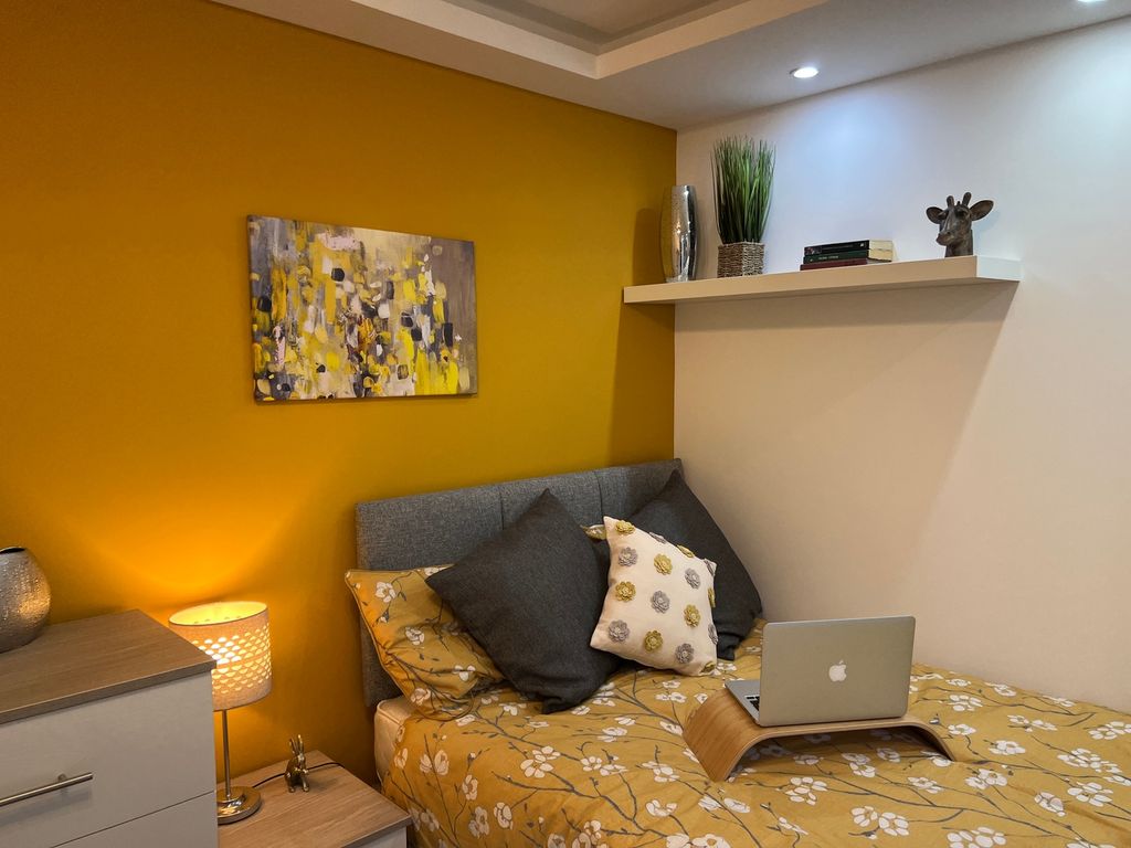 Property photo 1 of 23 A Cozy And Inviting Double Bedroom With A Warm Col...