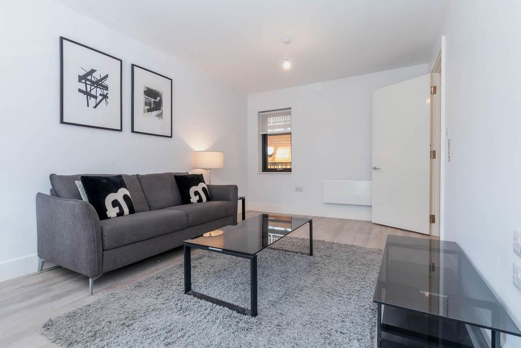 Property photo 2 of 11 Living Area