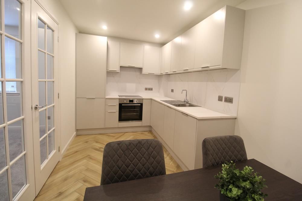 Property photo 3 of 7 Dining Kitchen Photo 2