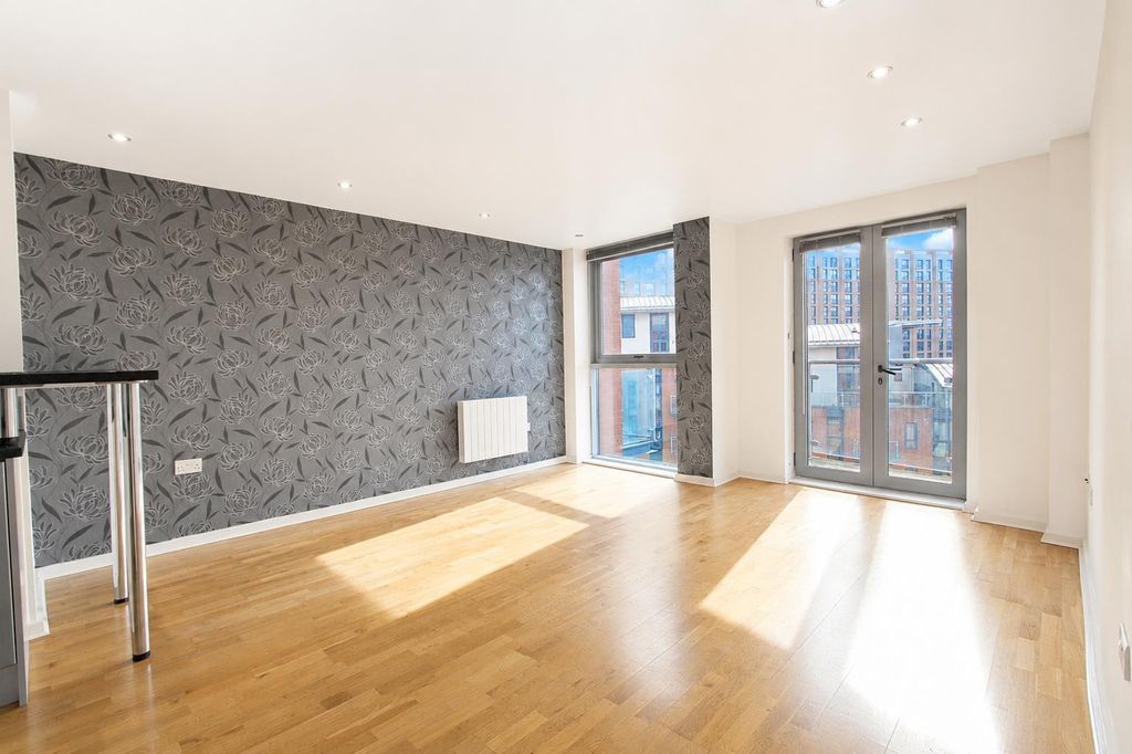 Property photo 1 of 12 Spacious Living Area With Great Natural Light...