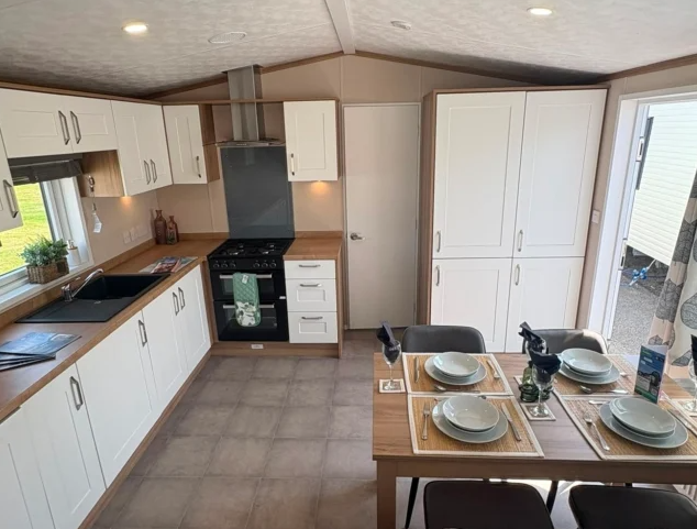 Property photo 2 of 7 Modern Kitchen And Dining Area Inside The Pemberton Marlow Holiday Caravan