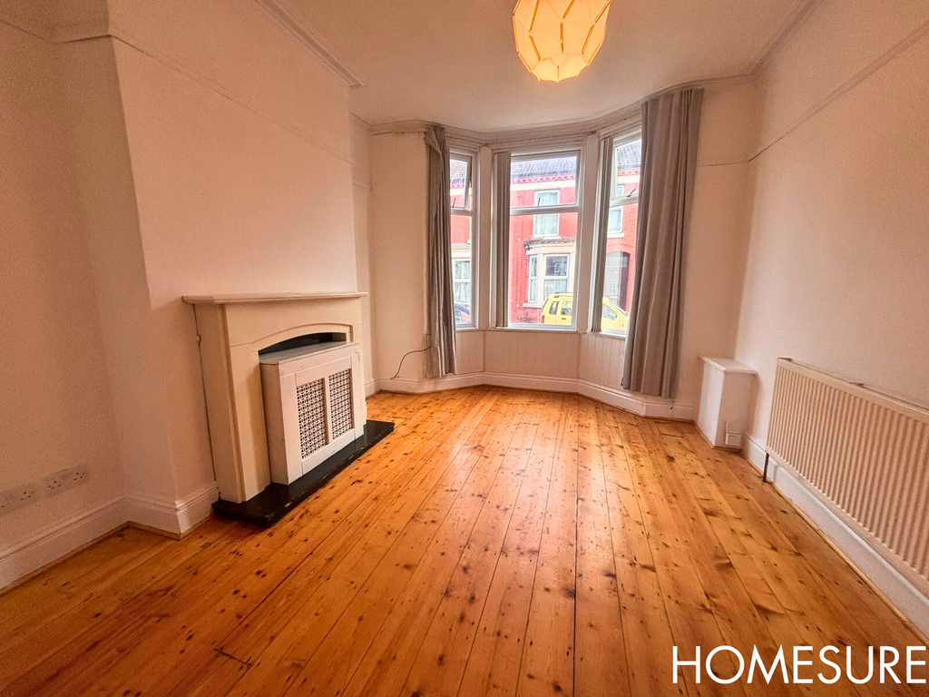 Property photo 3 of 16 Living1