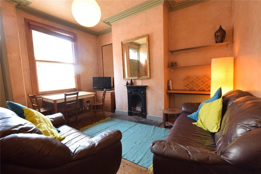 Property photo 3 of 9 A Cozy Living Room Featuring Comfortable Brown Lea...