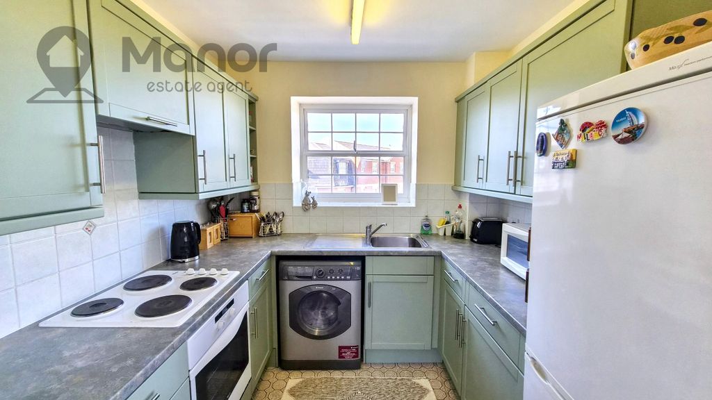 Property photo 3 of 16 Kitchen
