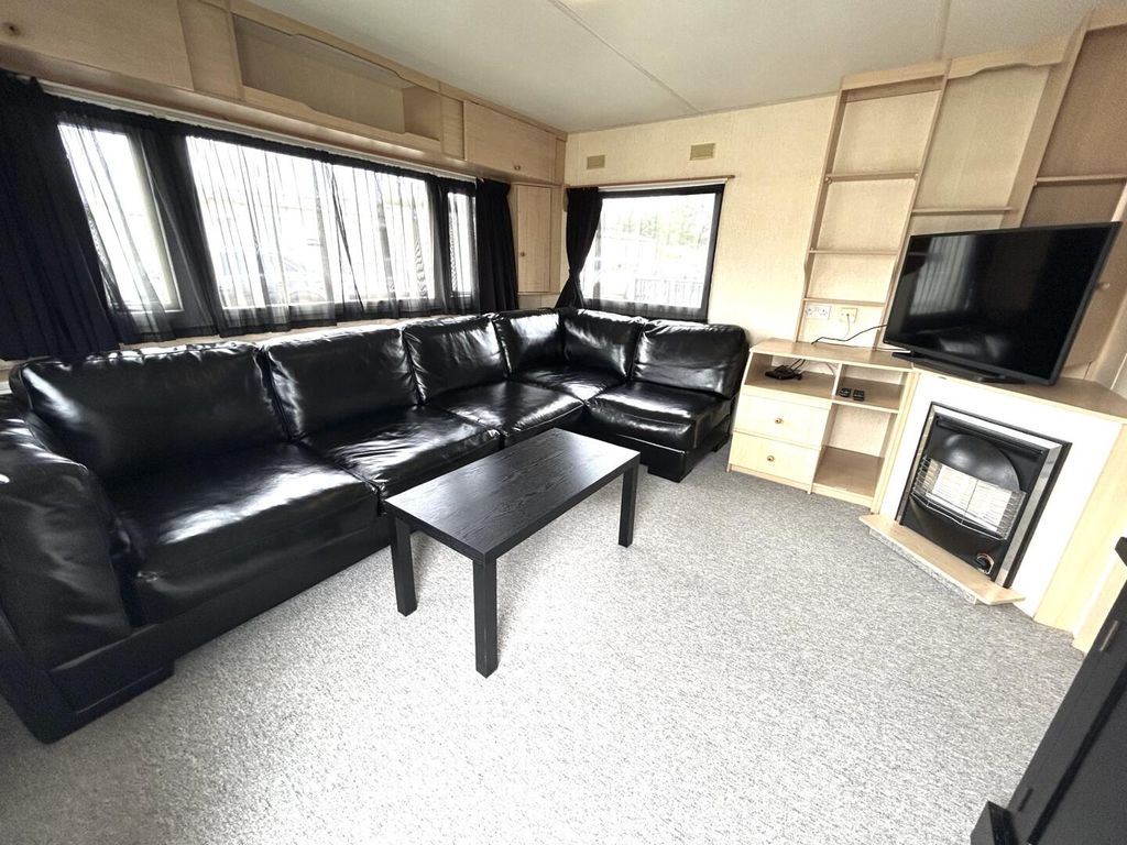 Property photo 2 of 12 Living Room