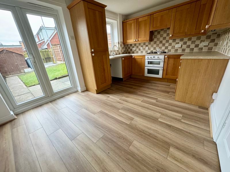 Property photo 3 of 13 Dining Kitchen