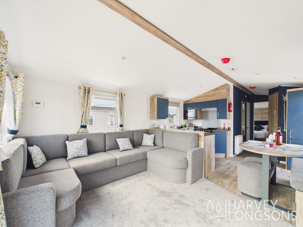 Property photo 3 of 13 Spacious Lounge With Corner Sofa, Dining Area And Open-Plan Kitchen.