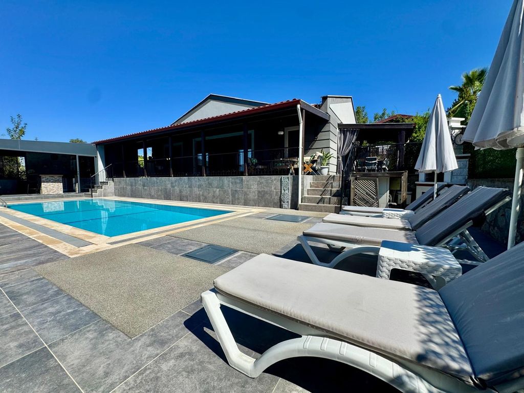 Property photo 1 of 25 Must-See Fethiye Property For Sale - Sunbathing Terraces Around The Pool