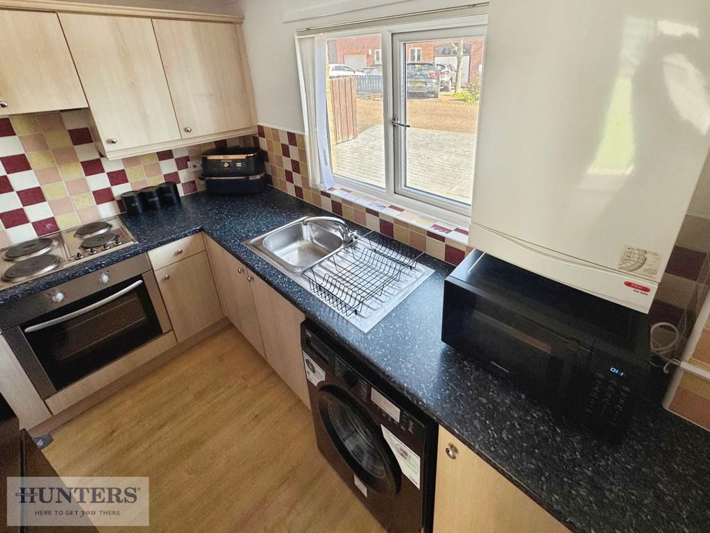 Property photo 3 of 8 Kitchen
