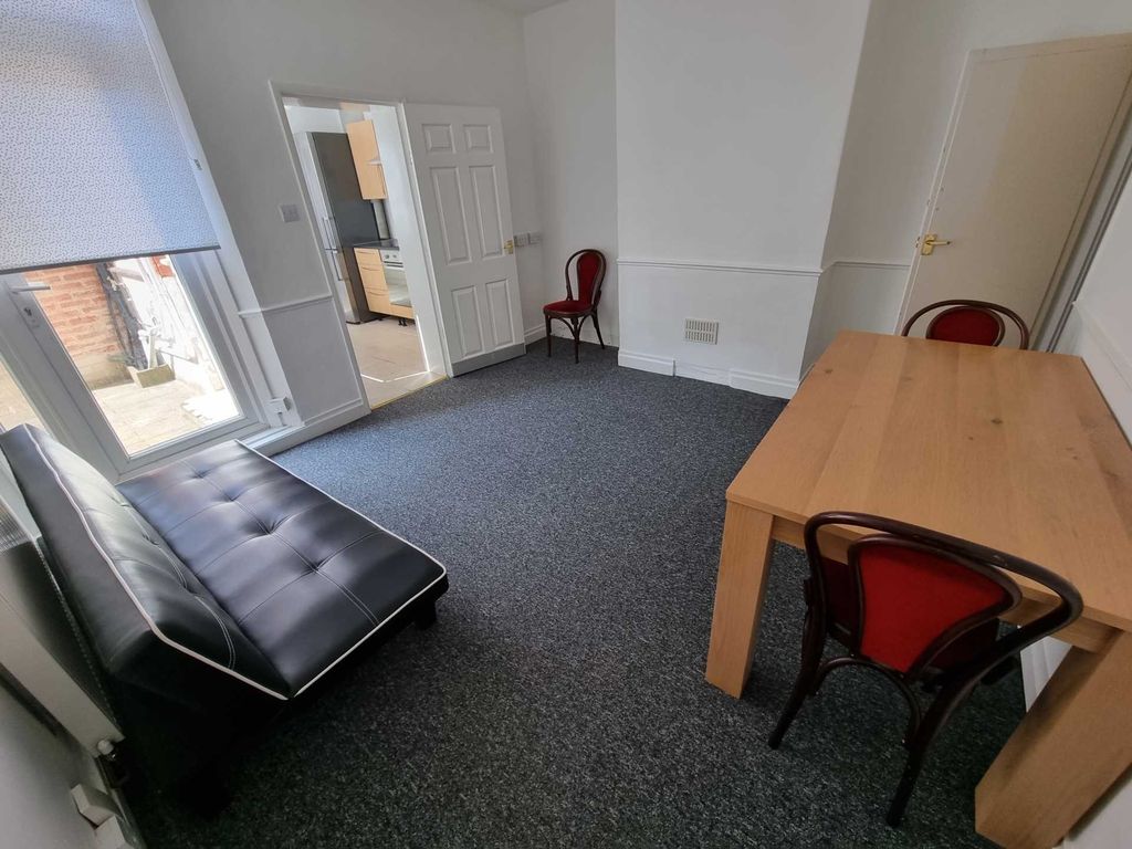 Property photo 3 of 10 Bright, Simply Furnished Living Room With A Large ...