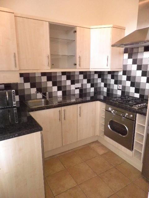 Property photo 3 of 6 Kitchen