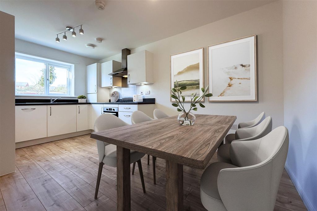 Property photo 3 of 9 Aldridge-Kitchendining(Staged).Jpg