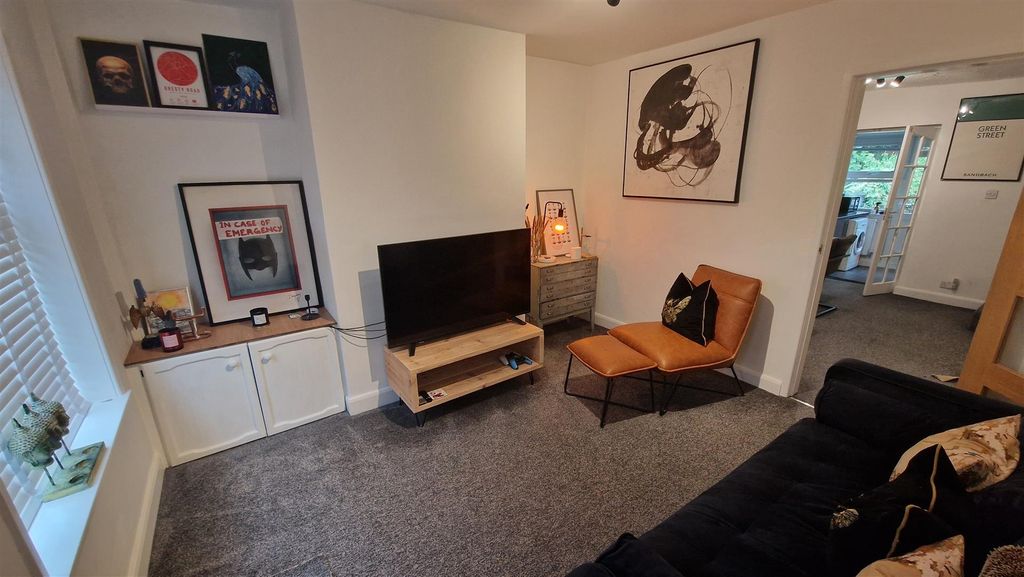 Property photo 2 of 13 Front Lounge
