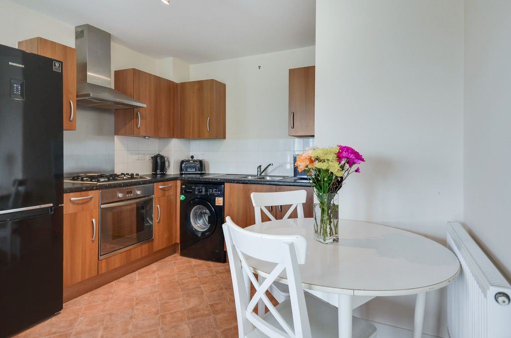 Property photo 3 of 11 Kitchen Dining Area.Jpg