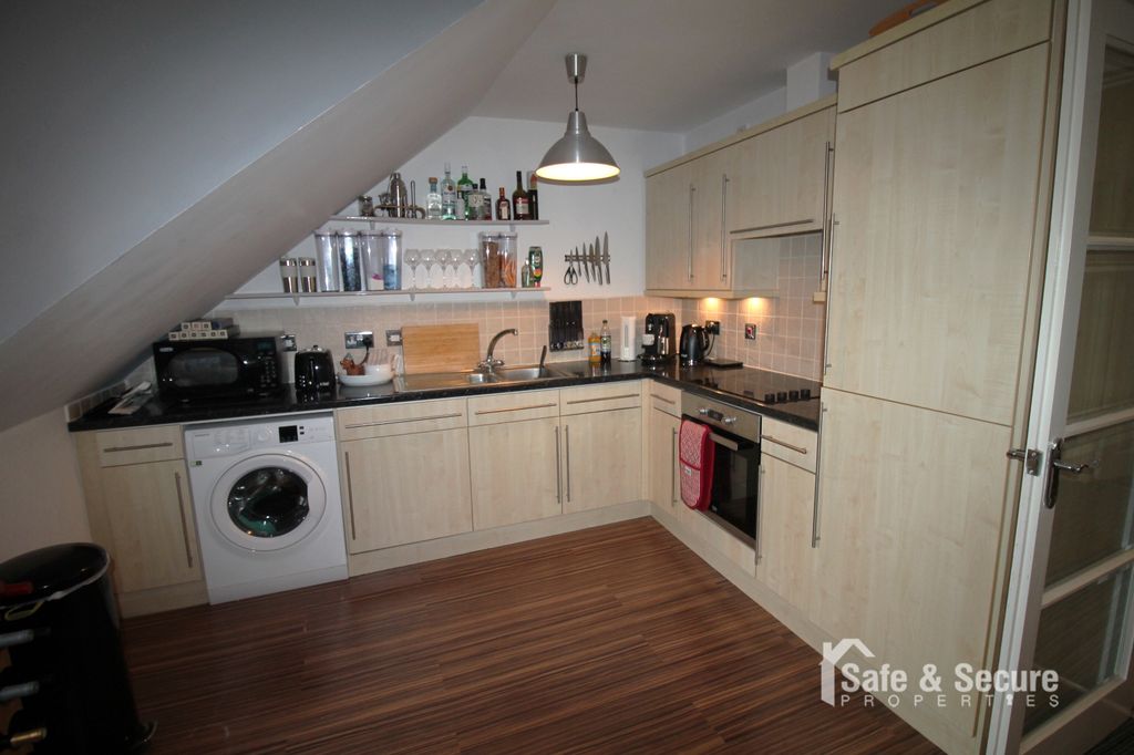 Property photo 2 of 10 Kitchen Area