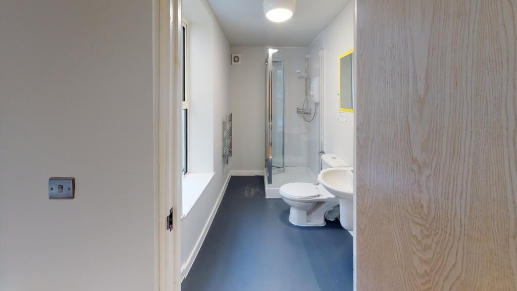 Property photo 3 of 3 Bright And Clean Bathroom With White Fixtures And ...